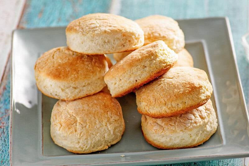 Copycat Cracker Barrel biscuits piled on a square plate.