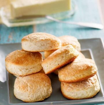 Copycat Cracker Barrel biscuits served with butter.