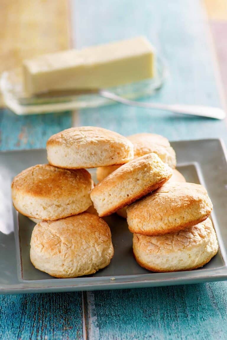 Copycat Cracker Barrel biscuits served with butter.
