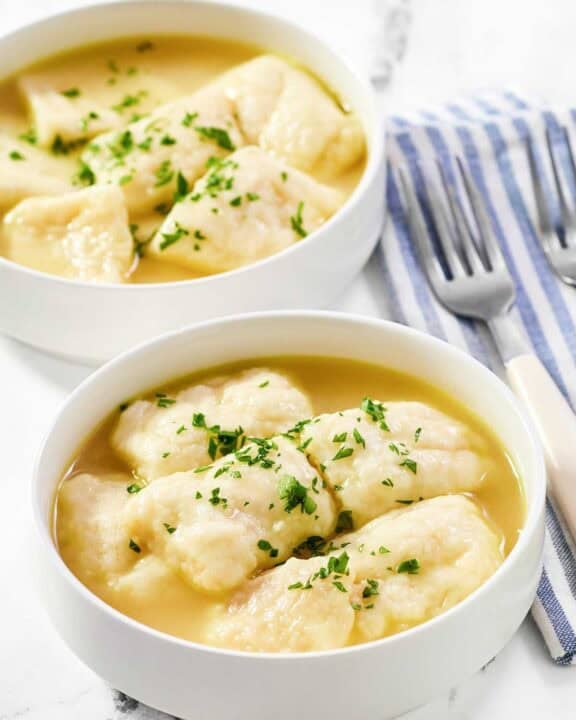 Copycat cracker barrel dumplings in two bowls.