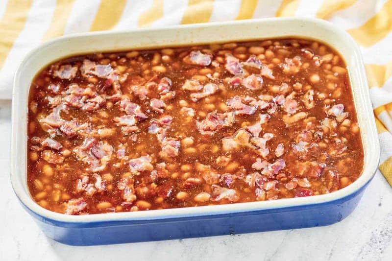 Copycat Durgin Park Boston baked beans in a casserole dish.