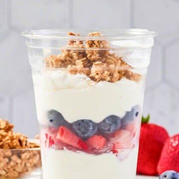 Copycat McDonald's fruit and yogurt parfait, granola, and berries.