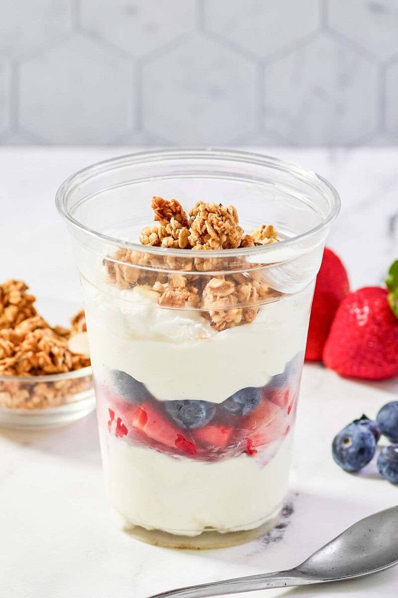 Copycat McDonald's fruit and yogurt parfait, berries, and granola.