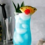 Homemade Olive Garden Blue Hawaiian cocktail in a hurricane glass.