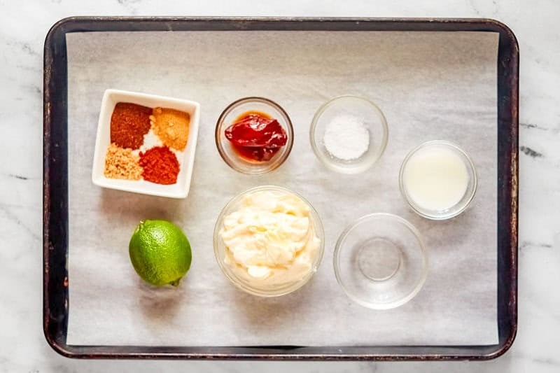 Copycat subway baja chipotle sauce ingredients on a tray.
