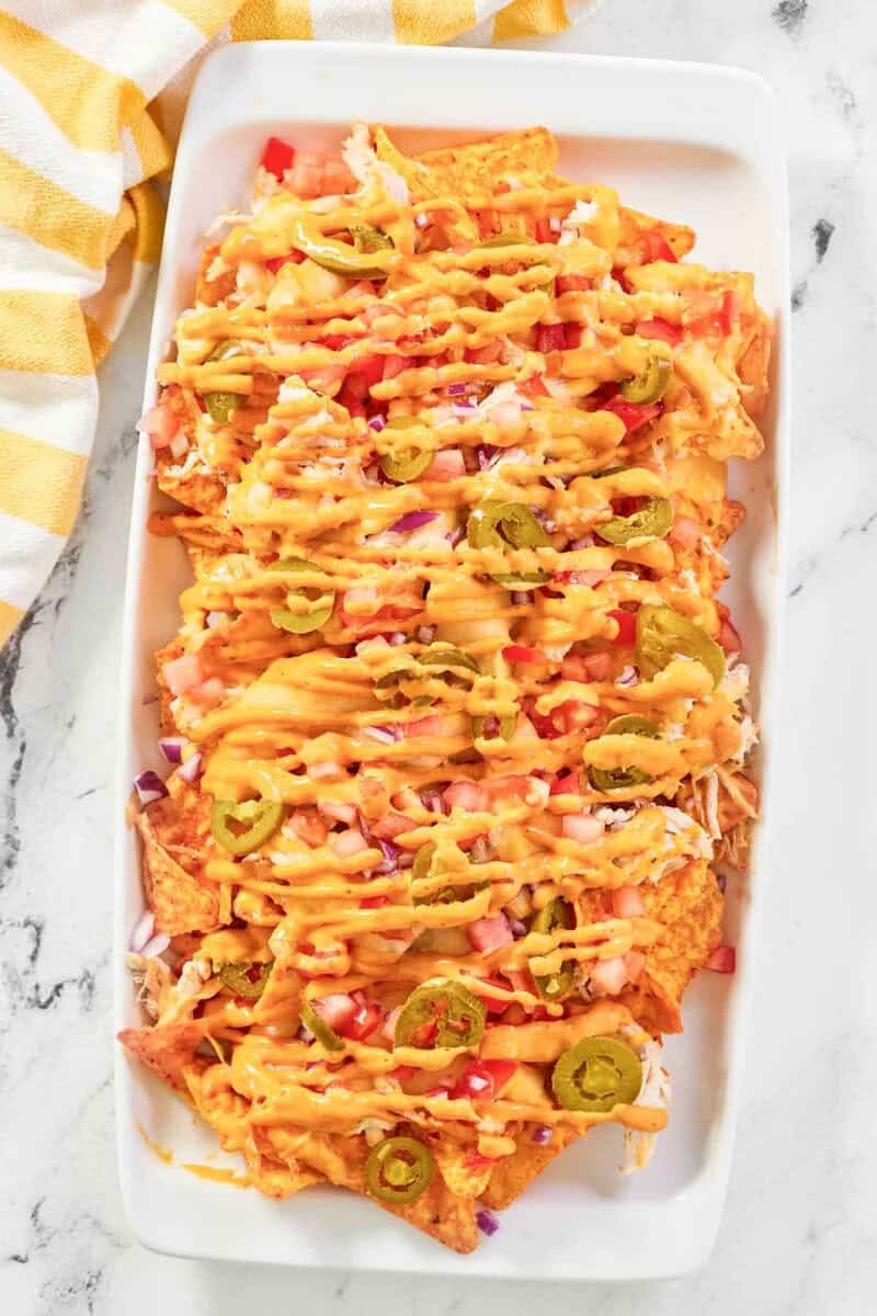 Copycat Subway Doritos chicken nachos on a platter.
