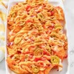 Copycat Subway Doritos footlong chicken nachos on a platter.