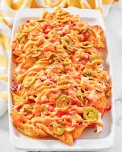 Copycat Subway Doritos footlong chicken nachos on a platter.