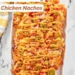 Homemade Subway Doritos chicken nachos on a long platter.