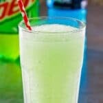 A glass of copycat Taco Bell baja blast freeze drink.