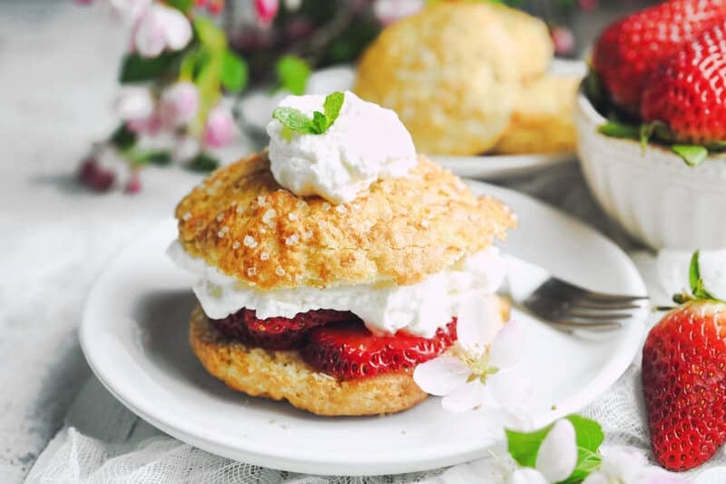 Copycat Ted's strawberry shortcake and a fork on a plate.