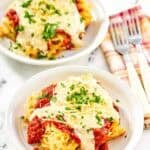 Copycat Cheddar's spasagna in two shallow bowls.