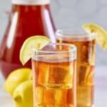 Copycat Chick-fil-A sweet tea in two glasses and a pitcher.