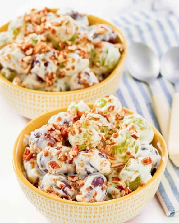 Copycat chicken salad chick grape salad in two bowls.