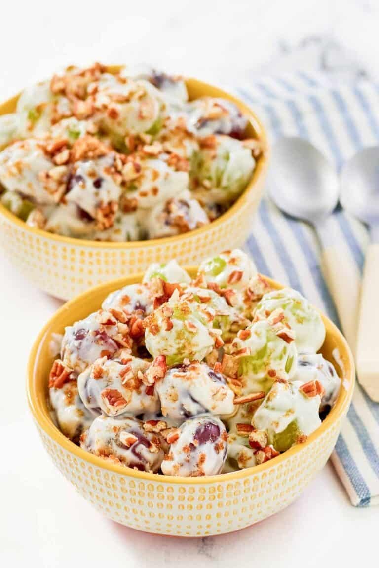 Copycat chicken salad chick grape salad in two bowls.