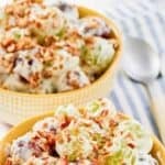 Two bowls of homemade chicken salad chick grape salad.