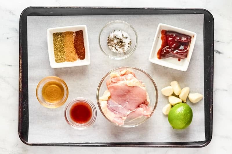 Copycat chipotle honey chicken ingredients on a tray.