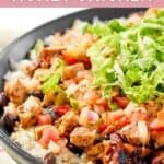 A bowl of homemade Chipotle's honey chicken over rice.