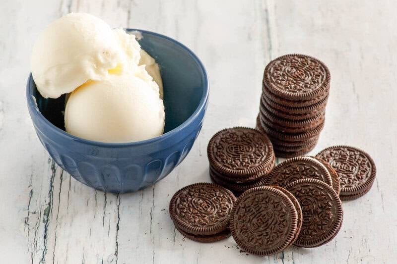 Copycat Diary Queen oreo blizzard ingredients on a wood surface.