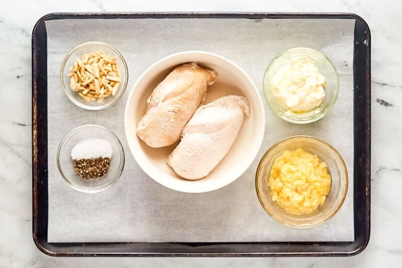 Copycat Jason's Deli chicken salad ingredients on a tray.