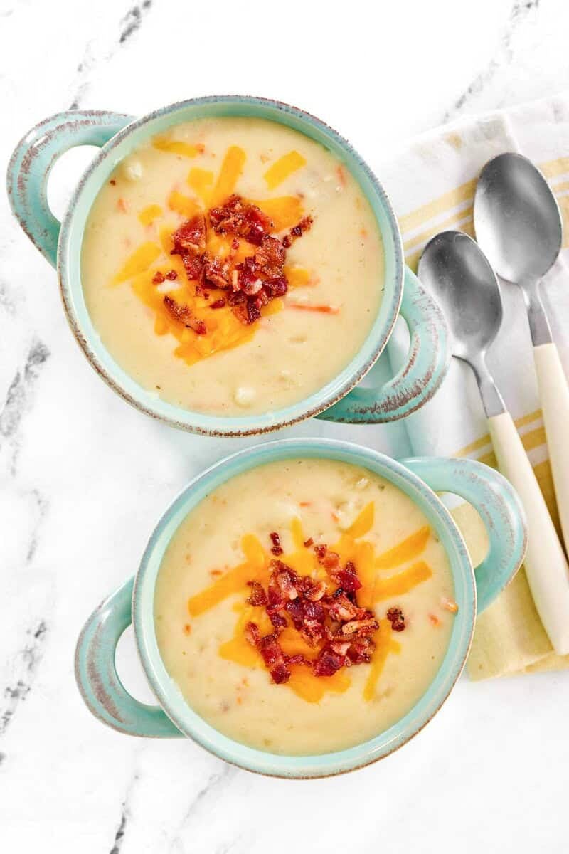 Copycat Jason's Deli Irish potato soup in two bowls.
