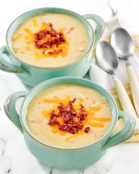 Copycat Jason's Deli Irish potato soup in two soup crocks.