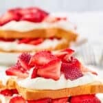 Homemade Jason's Deli strawberry shortcake on two plates.