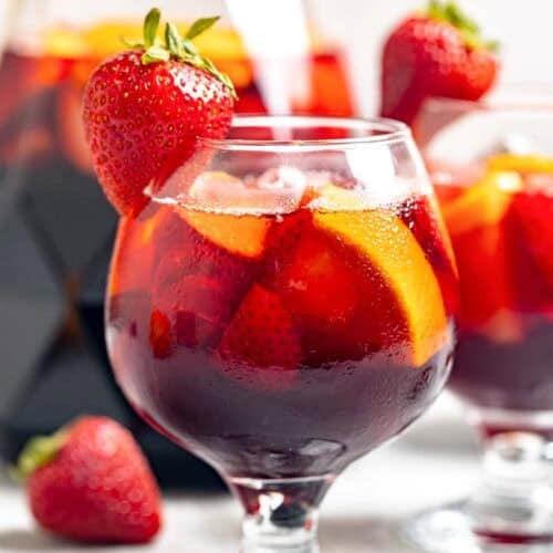 Copycat Olive Garden sangria in glasses and a pitcher.