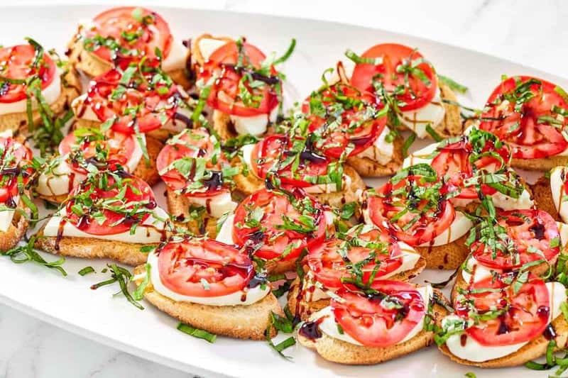 A platter of copycat spaghetti warehouse caprese bruschetta.
