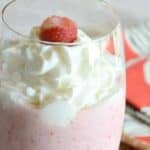 Homemade Starbucks strawberry creme frappuccino with whipped cream on top.