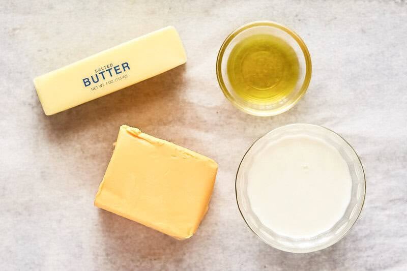 Copycat Taco Bell nacho cheese ingredients on parchment paper.