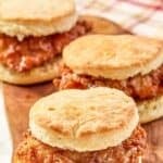 Three homemade Wendy's honey butter chicken biscuit sandwiches.