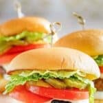 Homemade Culver's butter burgers on a wood serving board.