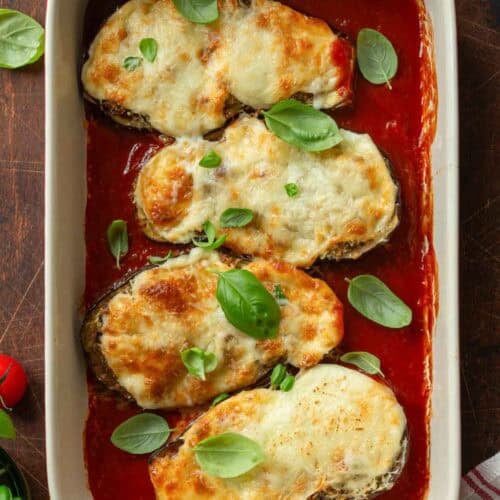 Eggplant parmesan in a baking dish.