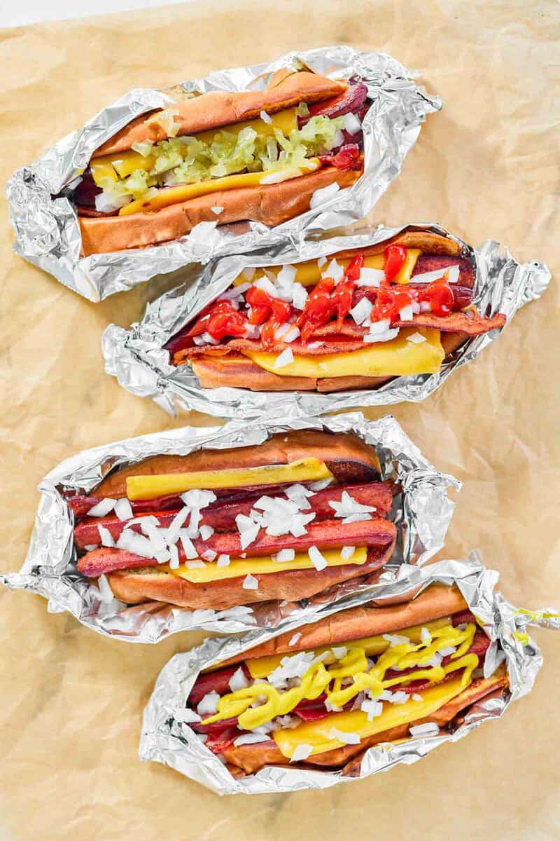 Copycat Five Guys hot dogs with different toppings.