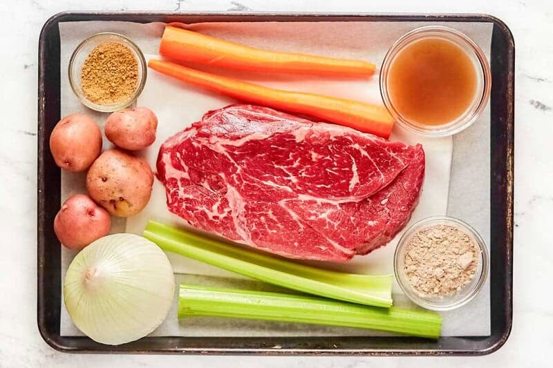 Copycat golden corral pot roast ingredients on a tray.