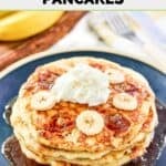 Homemade IHOP bananas foster pancakes, a banana, and a fork.