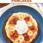 Homemade IHOP bananas foster pancakes with sliced bananas and brown sugar syrup.