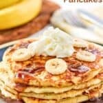 A stack of four homemade IHOP bananas foster pancakes on a plate.