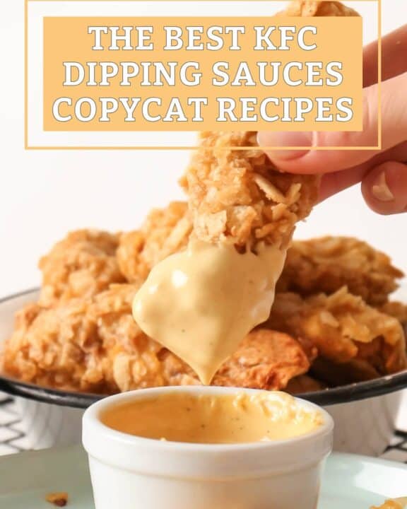Dipping a chicken strip into honey mustard sauce.