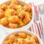 Two homemade KFC famous bowls with mashed potatoes and gravy.