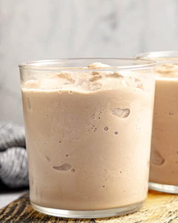 Copycat Wendy's chocolate frosty frozen treat on a wood board.