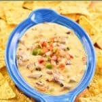 Homemade H-E-B brisket queso dip served with tortilla chips.