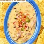Homemade HEB tex-mex brisket queso dip served with tortilla chips.