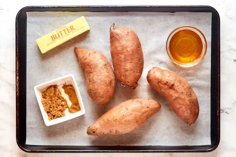 Copycat Outback Steakhouse baked sweet potato ingredients on a tray.