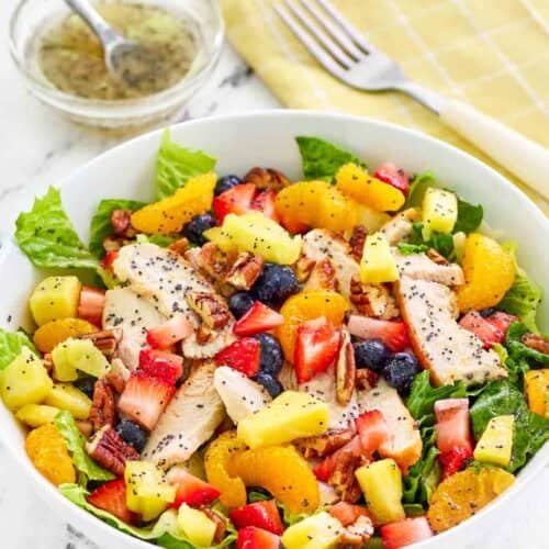 Copycat Panera strawberry poppyseed chicken salad and a fork on a napkin.