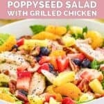 Homemade Panera strawberry poppyseed salad with grilled chicken in a bowl.