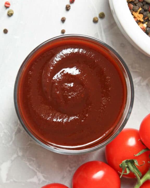 Copycat Swiss Chalet BBQ sauce, tomatoes, and peppercorns.