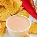 Copycat Chipotle adobo ranch in a small bowl and corn tortilla chips.