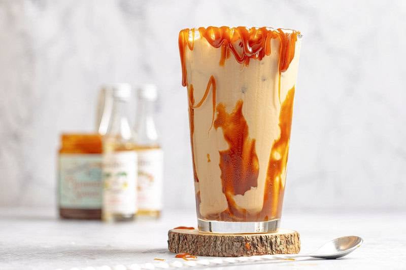 Copycat Dutch Bros golden eagle iced espresso drink with caramel sauce.